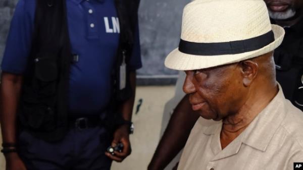 Opposition candidate Joseph Boakai arrives to vote in the second round of presidential elections in Monrovia, Liberia, Nov. 14, 2023.