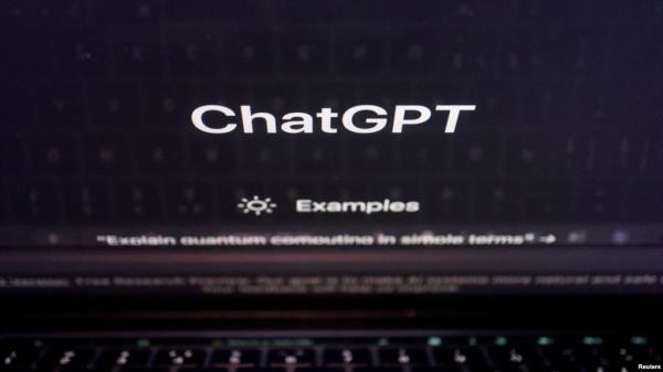 FILE - A keyboard is seen reflected on a computer screen displaying the website of ChatGPT, an AI chatbot from OpenAI, in this illustration picture taken Feb. 8, 2023. 