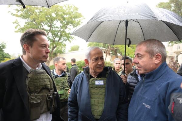 Musk (seen left with Israeli Prime Minister Benjamin Netanyahu and an unidentified individual) visited Israel more than a mo<em></em>nth after the Hamas attacks of Oct. 7.