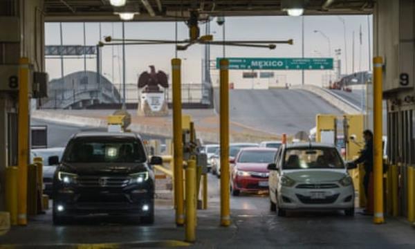 Customs and Border Protection agents check docu<em></em>ments of people entering the US at the Bridge of the Americas in El Paso.